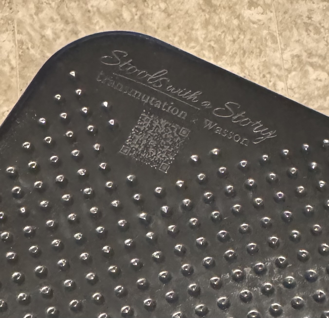 Embossed QR code on stool — Stools With a Story